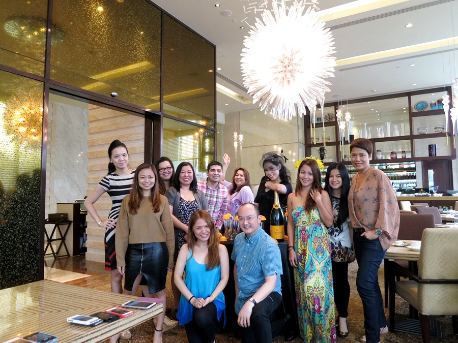 Standing: Ingrid Go, Sarah Santiago, Marbee Go, Tanya Lara, Chad Alarcon, Olga Azarcon, champagne lady, Charo Espedido, Myleen Tobias; Kneeling: Cheryl Tiu and Pepper Teehankee
