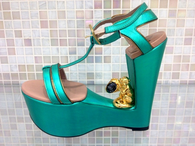 The ergonomically-designed Stuart Weitzman Triboro heel with the golden monkey gem caught everyone's attention
