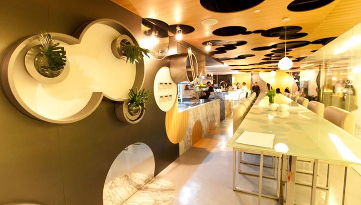 Vask's ceiling was originally intended by architect and co-owner Carlo Calma to look like perforated emmental cheese, but many have also said it reminds them of Hidden Mickey's