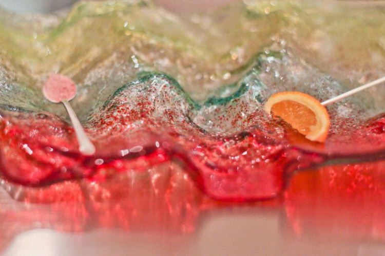 An experiment! Kind of like pop rocks candy which when eaten with a squeeze of an orange cleanses the palate to ready us for dessert!