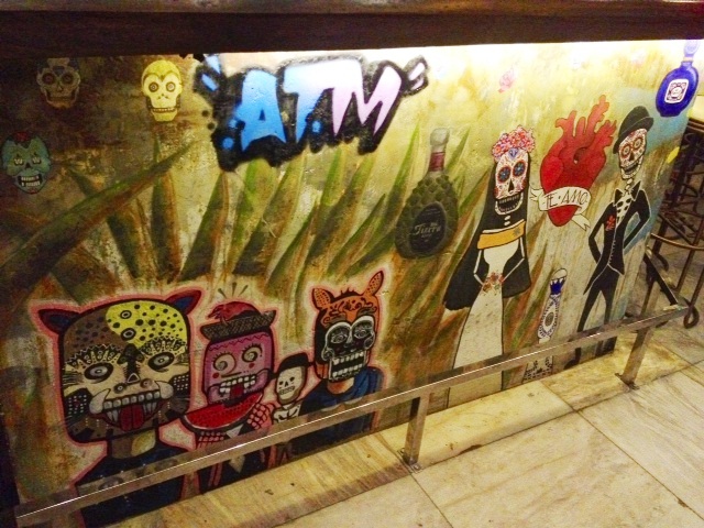Atoda Madre's hand-painted murals at the bar