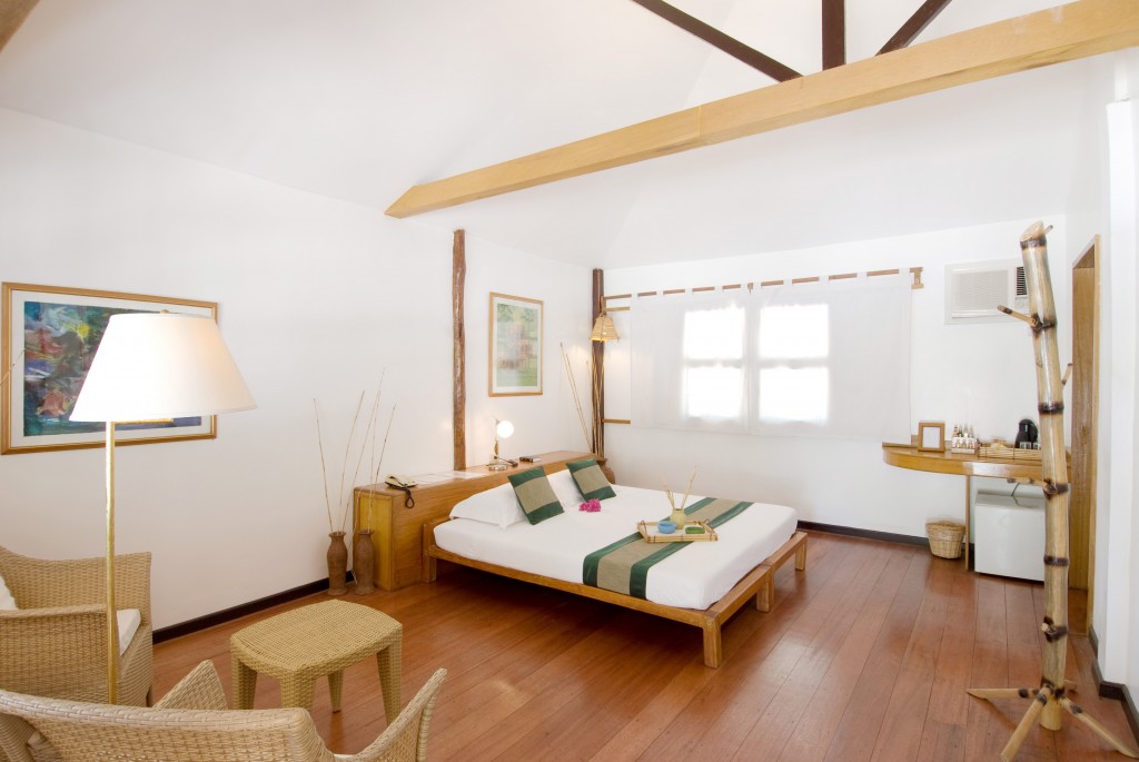 At the moment, not much has changed in the interiors of the beach front cottages-- still simple, rustic and cozy :) Renovations won't be til 2015. You can add another bed if you are three, like we did. (Photo courtesy of Discovery World/ Club Paradise)