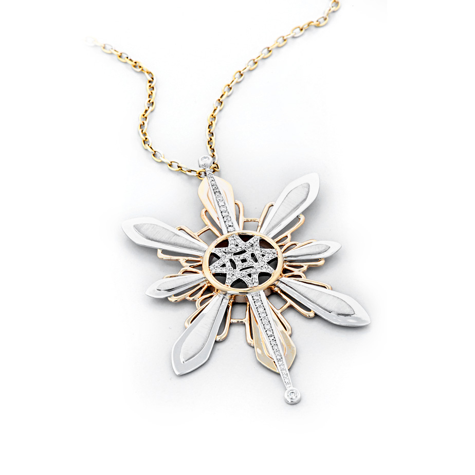 Three Stars and a Sun diamond pendant, 1.02 total carat weight, set in white and yellow gold