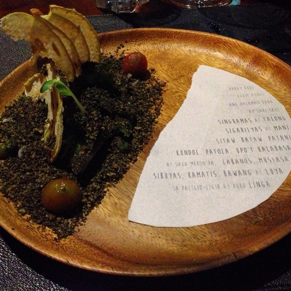 The famous "Bahay Kubo" garden vegetables which puts the 18 ingredients in the Filipino folk song onto a plate-- with the lyrics printed next to it; English translation at the back. Absolutely brilliant!