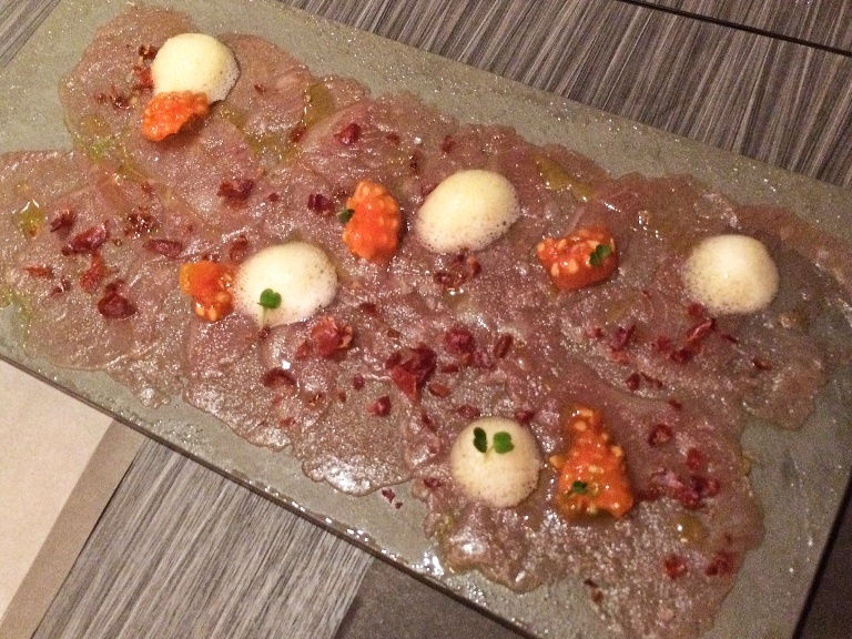 The Carpaccio de Atun (P195) or tuna carpaccio with tomato hearts, calamansi espuma and crispy jamon is probably the healthiest tapas I saw here!