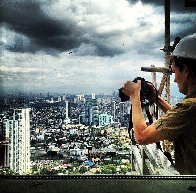 Frenchman Pierre-Emmanuel Michel flew into the country to photograph all the venues for Wallpaper* City Guide Manila! Here he is shooting our city from the 63rd floor of Discovery Primea.