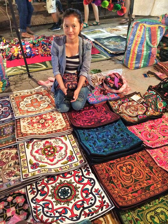 Gorgeous pillowcases handmade by this young Laoatian vendor at the street market at Sisavang Vong Road