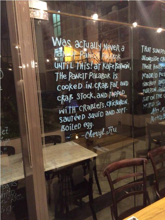 How cool, my blog post made it to the glass wall of Kafe Batwan! My brother Charles sent me a picture of this. Thanks guys! <3