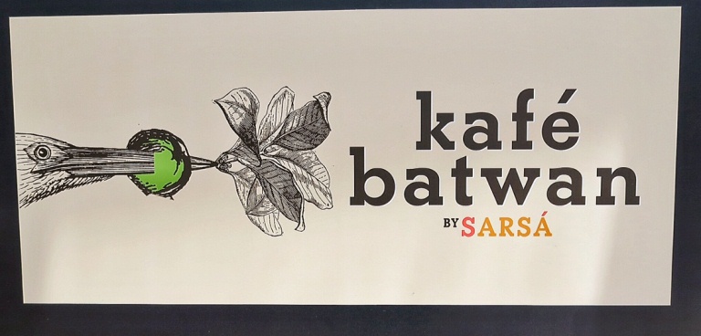 Notice the batwan/ batuan (the little green fruit) in their logo