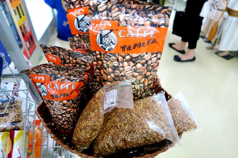 Tomoca Coffee is everywhere from the Tomoca cafes to supermarkets to the airport! Here in the photo with it is kola, which is a popular Ethiopian snack made from roasted barley