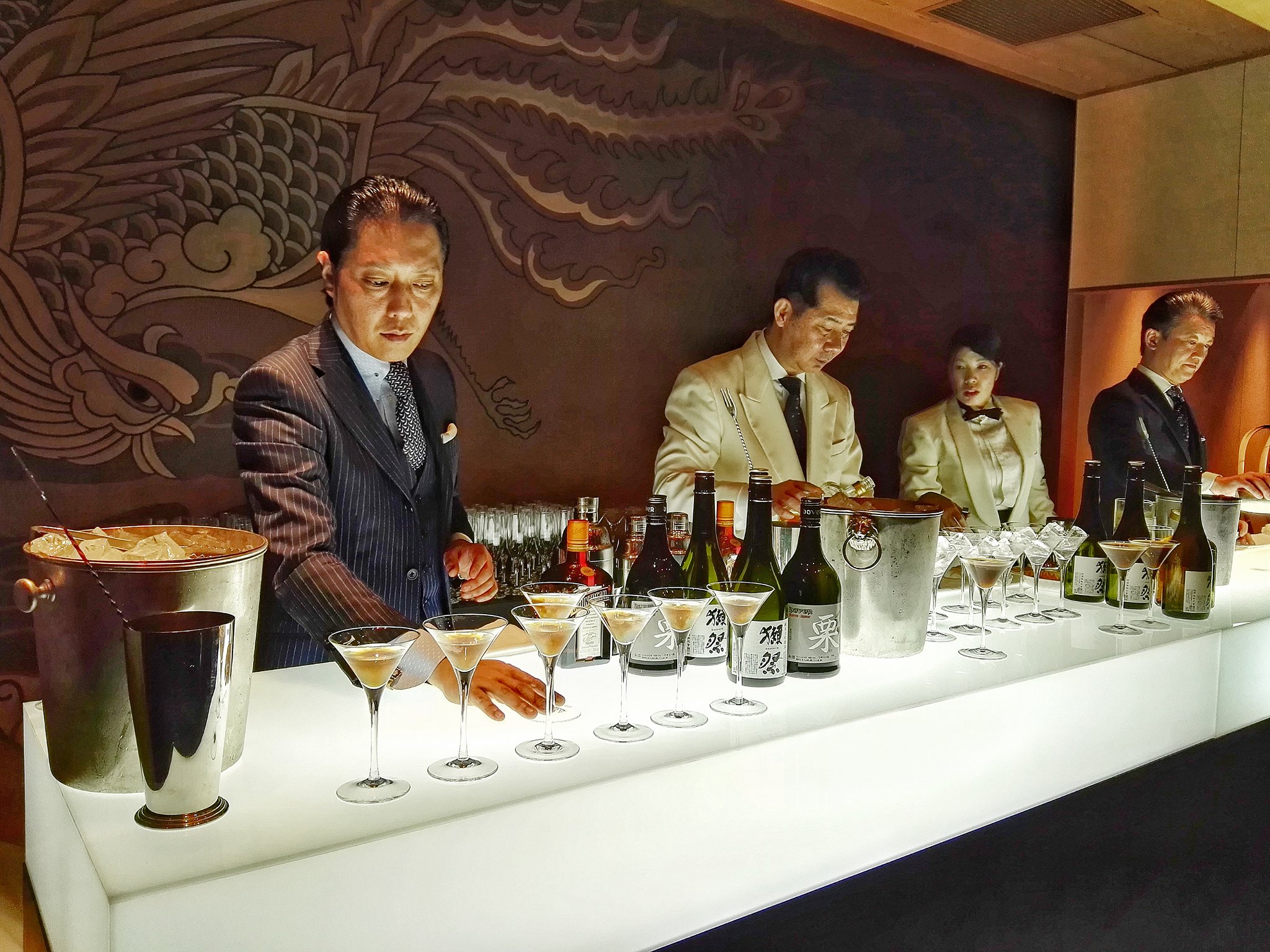 Noted Japanese bartender Yuichi Hoshi (center) created Nespresso-infused cocktails alongside supporting bartenders