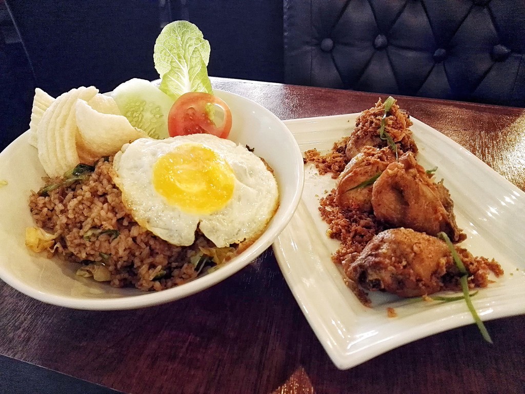Nasi Goreng Rendang (left) is fried rice infused with their signature beef rendang- and Ayam Kremas- fried chicken seasoned with Balinese spices with crisp spicy flakes. Both also good with the red and green chili sauces! I was just really stuffed from the martabak when these came along.