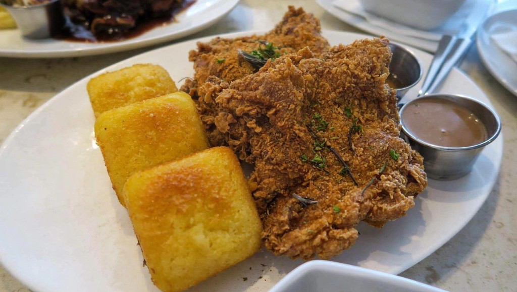 Buttermilk Fried Chicken with honey-glazed corn bread, country gravy and cajun honey