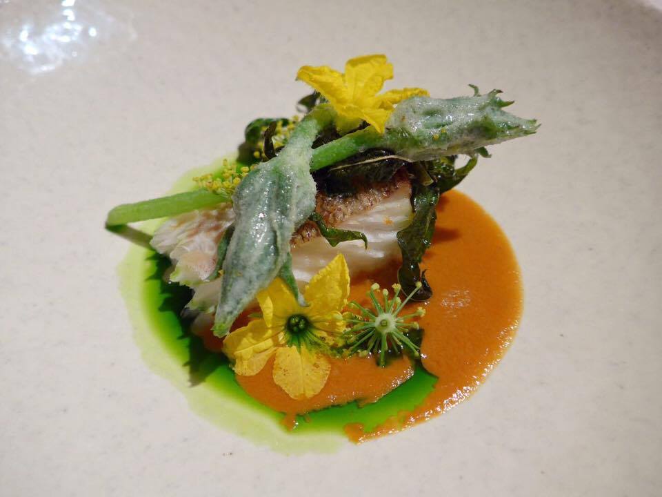 The first collaboration dish was between Hiroyasu Kawate (Florilege) and Gert de Mangeleer (Hertog Jan). It was cod - specifically a bycatch fish -with crab sauce and parsley oil and garnished with male zucchini flowers and fennel blossoms (parts that are normally thrown away). (Photo by Cheryl Tiu)