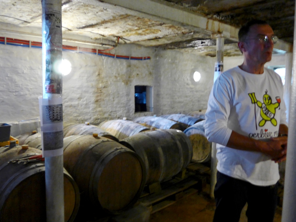 You're probably thinking.. why are we surrounded by oak barrels in a BREWERY? Because De Dolle does age some of their beers in oak! That's Kris Herteleer, founder and brewer (Photo by Cheryl Tiu)