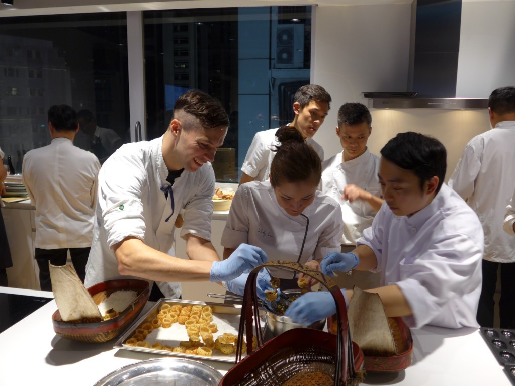 Dimsum Duets is all about collaboration: Max Levy of Okra and Vicky Lau of Tate helping each other out (Photo by Cheryl Tiu)