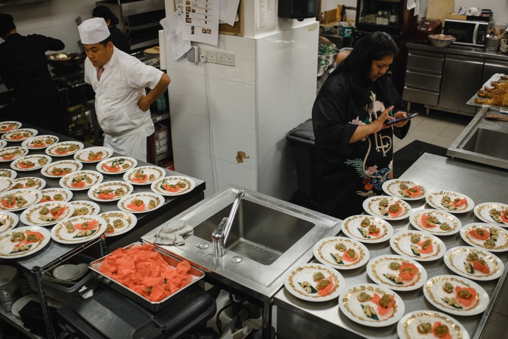 Assembly line of pica-pica ready! Philippine Pica Pica Crostini Topped with Balut Salpicao, Crab Gulong Gulong on Crispy Kiping, Memz Chicharon, Adobo Flakes 