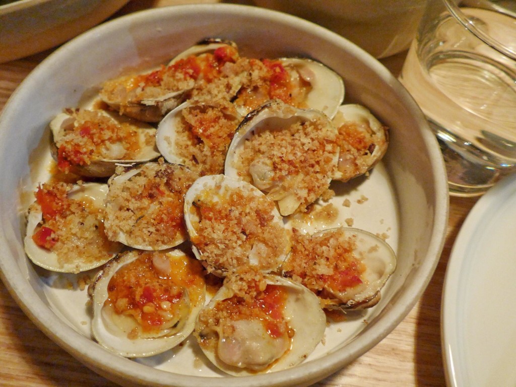 Grilled clams topped with Calabrian chili and breadcrumbs (Photo by Cheryl Tiu)