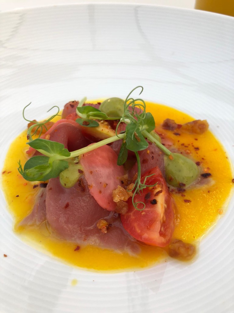 First course: Tuna tiradito, aji amarillo paste, lime pickled red radish, cassava crunch (Photo by Cheryl Tiu)