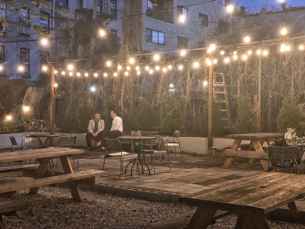 Popina has a nice outdoor seating at their backyard, with a bocce court to boot-- perfect for New York summers (Photo by Cheryl Tiu)